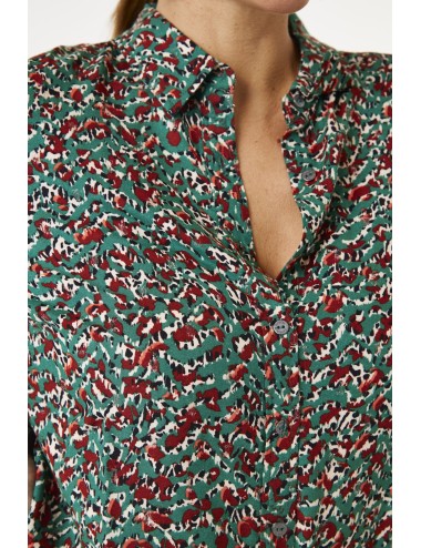 Blusa verde estampada...